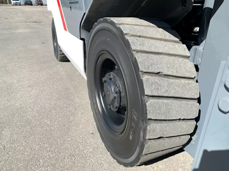 Вилочний автонавантажувач TCM (Nissan),  з напівкабіною,  піччю 2