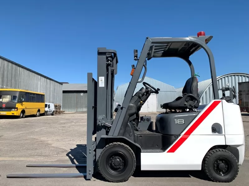 Вилочний автонавантажувач TCM (Nissan),  з напівкабіною,  піччю