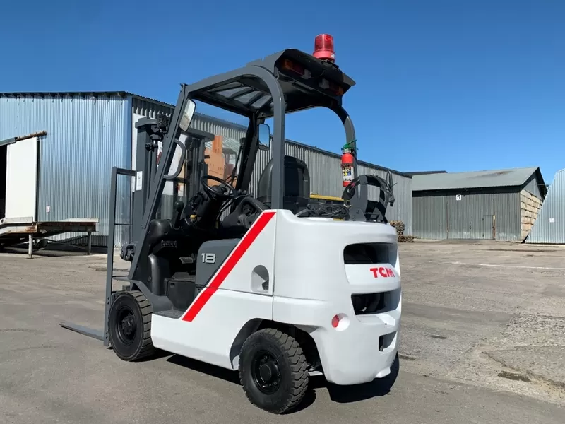 Вилочний автонавантажувач TCM (Nissan),  з напівкабіною,  піччю 9