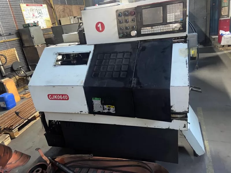 Продам б/у токарный станок с ЧПУ CJK0640 